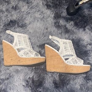 White wedges by Carlos Santana